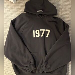 Essentials Black Hoodie 1977